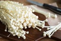 Enoki mushroom on old wooden table