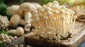 Enoki mushroom with spoon on wooden table for cooking Royalty Free Stock Photo
