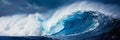 Enormous colossal ocean wave towering dramatically under a vividly clear blue sky