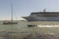 Enormous cruise ship sailing beside Venice in Italy.