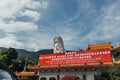 Enormous Guanyin statue over chinese style building at Kek Lok Si Temple at George Town. Panang, Malaysia