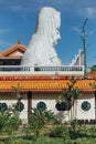 Enormous Guanyin statue over chinese style building at Kek Lok Si Temple at George Town. Panang, Malaysia Royalty Free Stock Photo