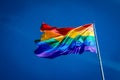 Enormous rainbow flag flying proud over Harvey Milk Plaza in the Castro district of San Francisco California Royalty Free Stock Photo