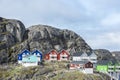 Enormous rocks, colorful houses