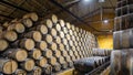 Enormous stacks of oak barrels aging tequila in Mexico