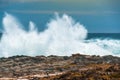 An enormous wave crashing against the rocks at Storms River Mouth, South Africa Royalty Free Stock Photo