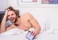 Enough sleep for him. Regulate your bodys clock. Man unshaven tousled hair wakeful face having rest. Good morning. Man Royalty Free Stock Photo