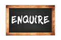 ENQUIRE text written on wooden frame school blackboard