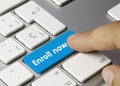 Enroll now - Inscription on Blue Keyboard Key Royalty Free Stock Photo