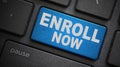 Enroll now text button on keyboard Royalty Free Stock Photo
