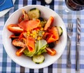 Ensalada de gambas - salad with salmon, shrimp and vegetables.