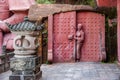 Enshi toast toast Imperial City Nine into Hall carved on the rock Tujia people statues Royalty Free Stock Photo