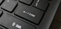 Enter button on laptop keyboard. Enter keyboard key button on a computer. Close up of Enter key of Laptop computer. Royalty Free Stock Photo