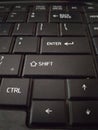 enter, shift, ctrl, and other keys from a black laptop keyboard Royalty Free Stock Photo