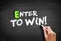 Enter to win text on blackboard Royalty Free Stock Photo