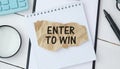 Enter to win text on paper. Word Enter to win Royalty Free Stock Photo