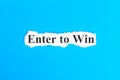 Enter to win text on paper. Word Enter to win on torn paper. Concept Image Royalty Free Stock Photo