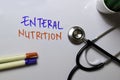 Enteral Nutrition write on white board white stethoscope. Medical or Healthare concept