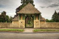 Enterance to graveyard with locked gates Royalty Free Stock Photo