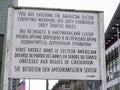 Entering american sector sign at checkpoint charlie in berlin, germany