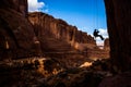 Entering a narrow canyon hanging in air, rappelling in Arches National Park, Utah Royalty Free Stock Photo