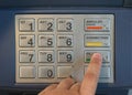 Entering nip code numbers in cash machine by pressing buttons