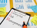 Enterprise Risk Management ERM is shown on the conceptual business photo