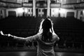 Entertainer performing on a stage in a empty theater,concert hall without fans.No audience.COVID-19 canceled show.Opera house