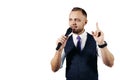 The entertainer. Young elegant talking man holding microphone, Isolated on white background Royalty Free Stock Photo