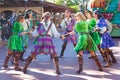 Entertainers in colorful costumes participating in DisneyWorld parade