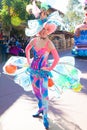 Entertainers in colorful costumes participating in DisneyWorld parade