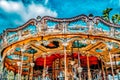 Entertainment Carousel for the youngest children. Horses on a carnival Royalty Free Stock Photo