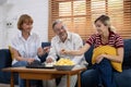 For entertainment and leisure, the family plays chessboard in the living room