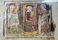 Enthroned Madonna and Child, Saints Christopher, Catherine, George and a worshipper Knight Royalty Free Stock Photo