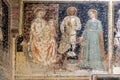 Enthroned Madonna and Child, Saints George, Catherine and a worshipper Knight Royalty Free Stock Photo