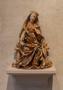 The Enthroned Virgin made of limewood with paint and gilding circa 1500 on display in the Cloisters in New York City. Royalty Free Stock Photo