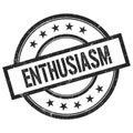 ENTHUSIASM text written on black vintage round stamp