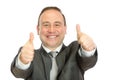 Enthusiastic businessman giving thumbs up signal Royalty Free Stock Photo