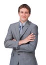 Enthusiastic businessman standing with folded arms Royalty Free Stock Photo
