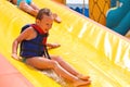 Enthusiastic children on slide