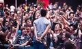 Enthusiastic crowd during a rock concert Royalty Free Stock Photo