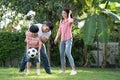 Enthusiastic families spend their free time together in their free time at the front lawn Royalty Free Stock Photo