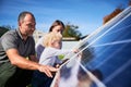 Enthusiastic father showing potential of alternative energy.