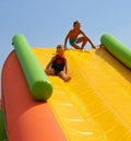 Enthusiastic kids on slide