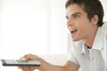 Enthusiastic Man with Remote Control Royalty Free Stock Photo
