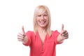 Enthusiastic motivated woman giving a thumbs up Royalty Free Stock Photo