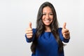 Enthusiastic motivated woman giving a thumbs up Royalty Free Stock Photo