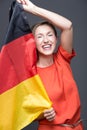 Enthusiastic patriotic woman with the German flag