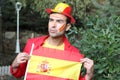 Enthusiastic Spanish man waving the national flag Royalty Free Stock Photo