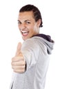 Enthusiastic teenager holds thumb up Royalty Free Stock Photo